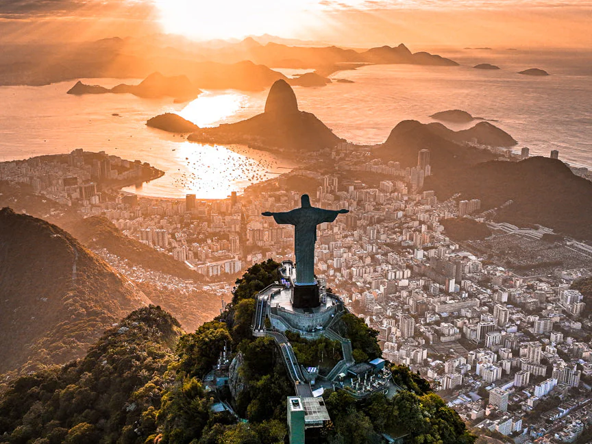 Christ the Redeemer overlooking Rio at golden hour